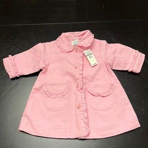 Pink baby girl dress coat with ruffle detail. Size 3-6 months.